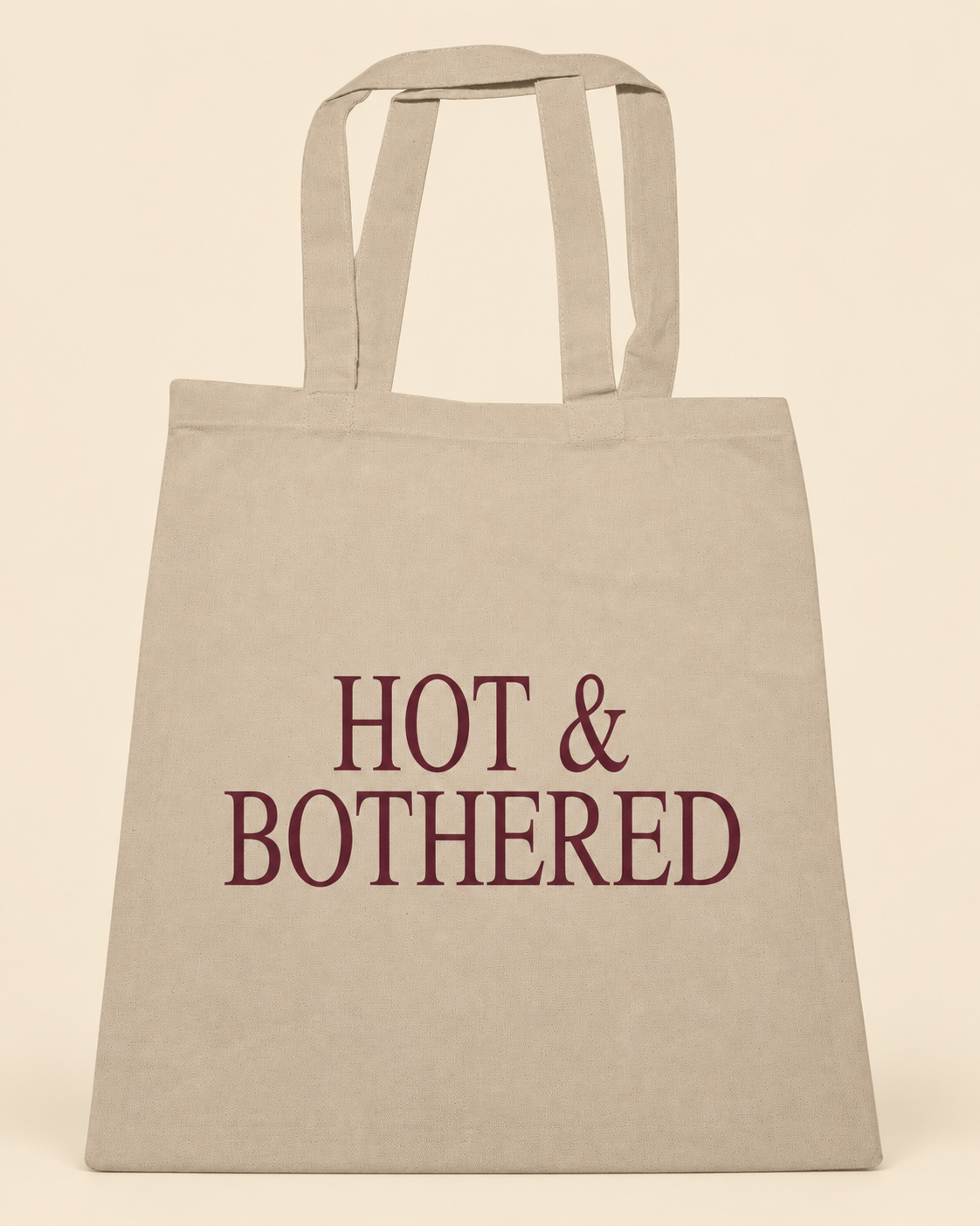 Hot & Bothered canvas tote on a cream background